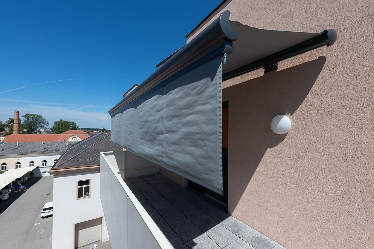 Einfamilienhaus mit PALMA Kassettenmarkise und Vertima